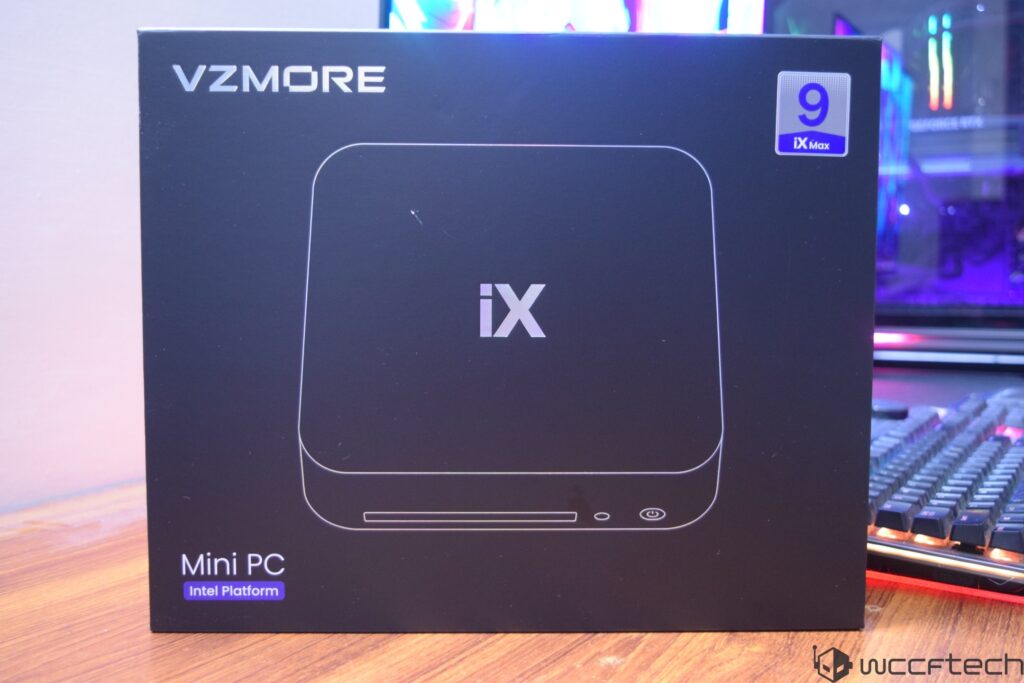 A black box featuring the VZMORE iX Mini PC with a label 'Intel Platform' and a sticker indicating '9 iX Max' on a desk besid